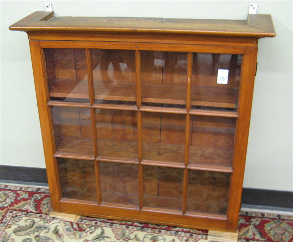 Appraisal: PINE DISPLAY CABINET American late th century wall mount with