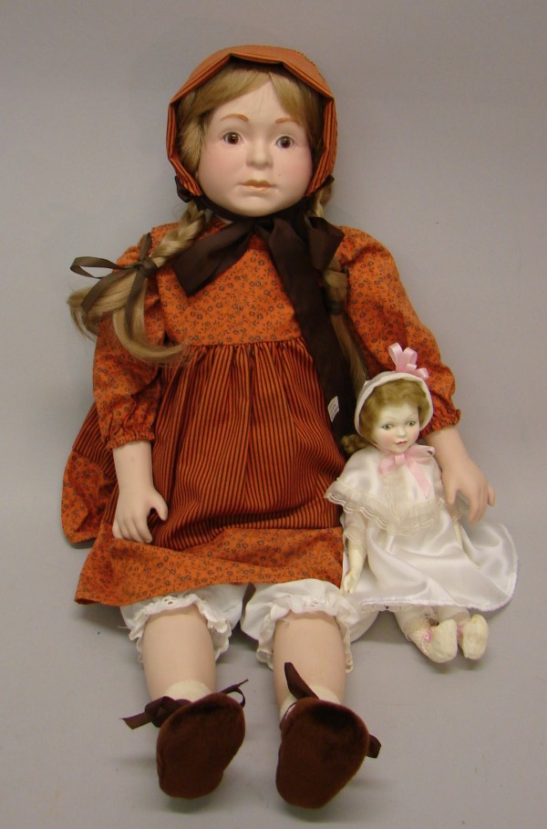 Appraisal: Pair of dolls Royal Doulton and Nisbet doll China head