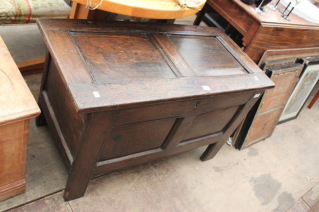 Appraisal: AN ANTIQUE OAK COFFER with panelled front and sides and