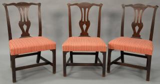 Appraisal: Three Chippendale mahogany side chairs with fully upholstered seats circa