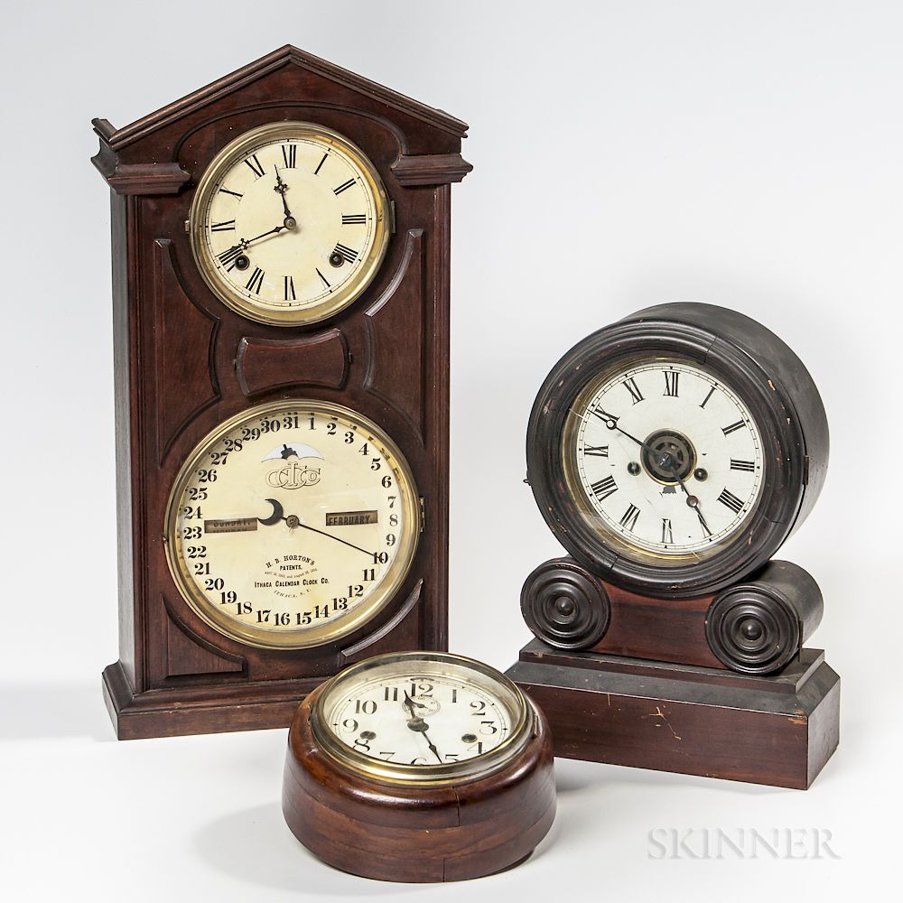 Appraisal: Three American Clocks Three American Clocks a walnut-cased Ithaca calendar