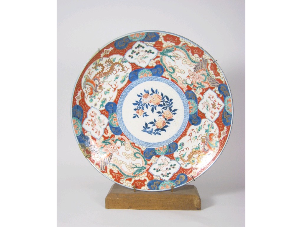 Appraisal: A large Imari Charger decorated flowers and birds some restoration