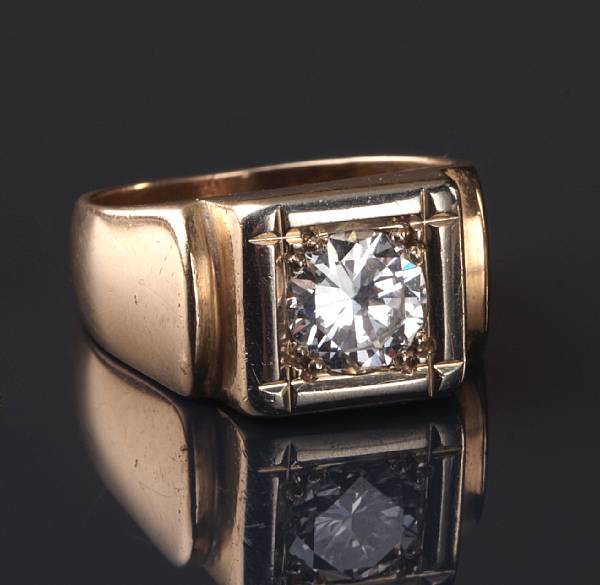 Appraisal: A diamond and k gold ring diamond estimated to weigh