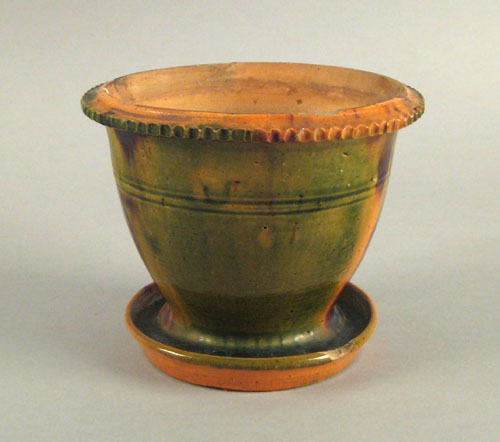 Appraisal: Pennsylvania redware flower pot th c with a coggled rim