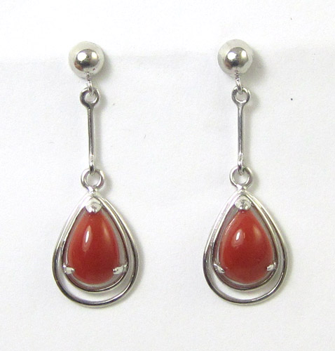 Appraisal: PAIR OF CORAL AND FOURTEEN KARAT WHITE GOLD PENDANT EARRINGS