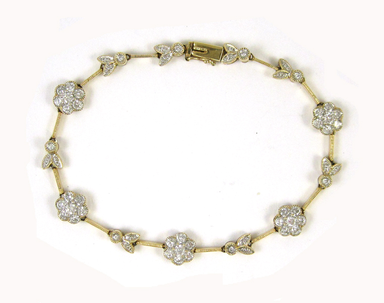 Appraisal: DIAMOND AND FOURTEEN KARAT GOLD BRACELET with IGS appraisal The