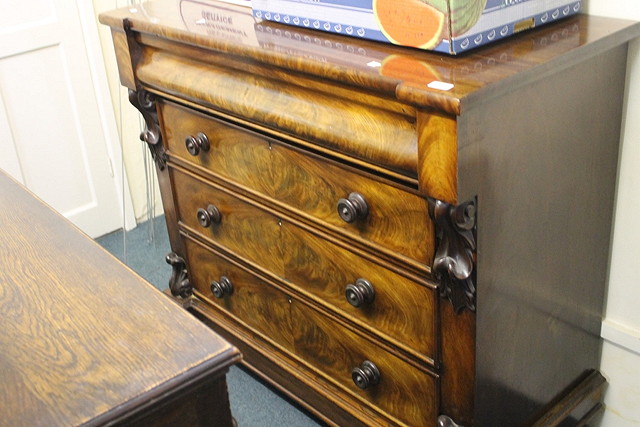 Appraisal: A VICTORIAN MAHOGANY CHEST of three long drawers with knob