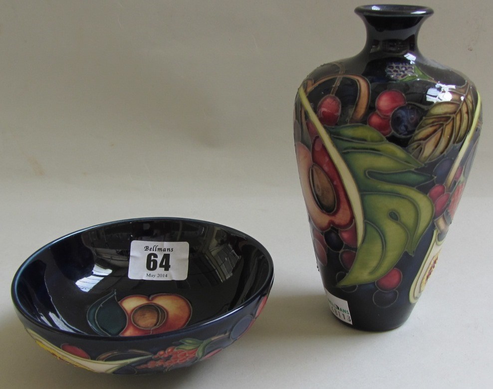 Appraisal: A Moorcroft small 'Queen's Choice' pattern vase and a dish