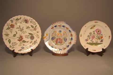 Appraisal: THREE DECORATIVE PLATES including a Haviland MMA reproduction of a