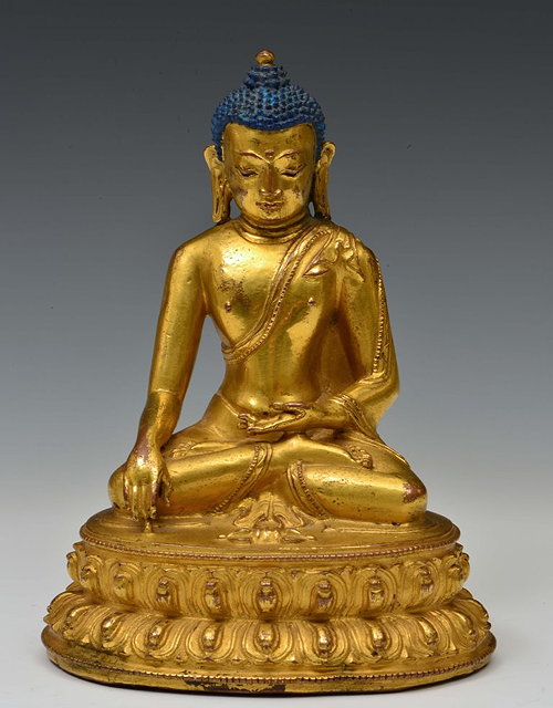 Appraisal: A SINO-TIBETAN GILT BRONZE FIGURE of a seated buddha in