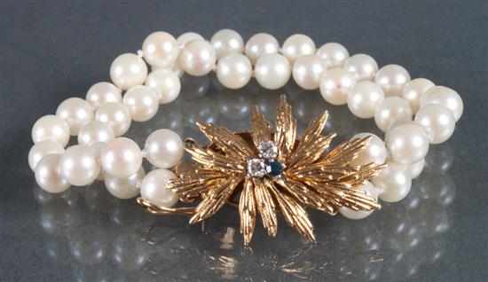 Appraisal: Cultured pearl bracelet with a K gold diamond and sapphire