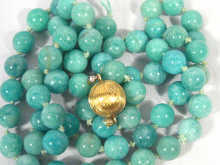 Appraisal: A green glass bead necklace cm long needs re-stringing beads