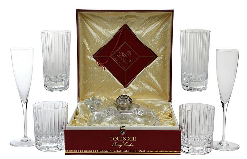 Appraisal: Baccarat Decanter Champagnes and Tumblers Baccarat contemporary Remy Martin cognac