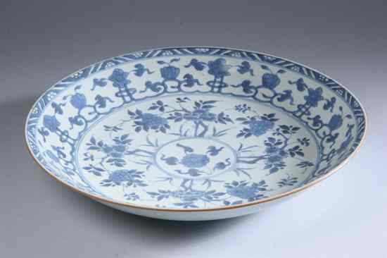 Appraisal: CHINESE BLUE AND WHITE PORCELAIN CHARGER Kangxi period Floral decoration