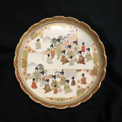 Appraisal: Japanese Satsuma Pottery Dish signed figures heavy goldwork scalloped rim