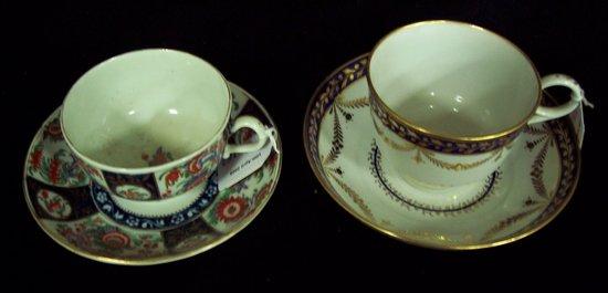 Appraisal: A Worcester cup and saucer with alternating panels of Chinese