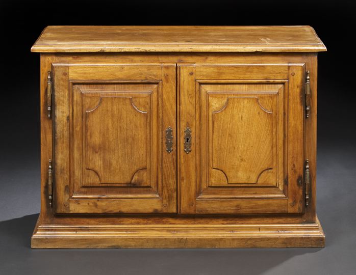 Appraisal: French Provincial Fruitwood Cabinet late th century the rectangular top