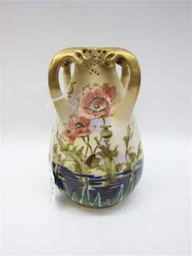 Appraisal: AUSTRIAN AMPHORA PORCELAIN VASE with four handles hand enameled decoration