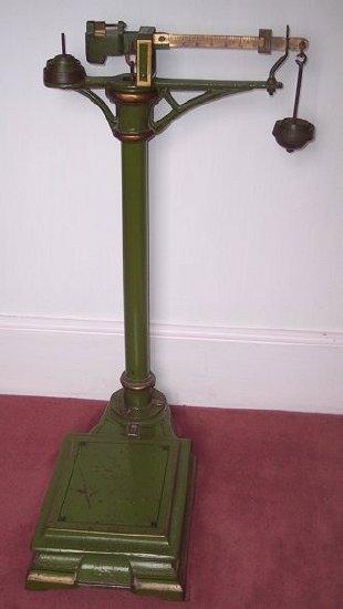 Appraisal: A set of Victorian iron scales parcel gilt and green