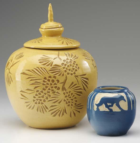 Appraisal: NORTH DAKOTA SCHOOL OF MINES Two vases one lidded carved