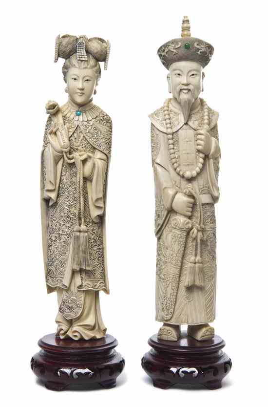 Appraisal: A Pair of Chinese Ivory Carvings of an Emperor and