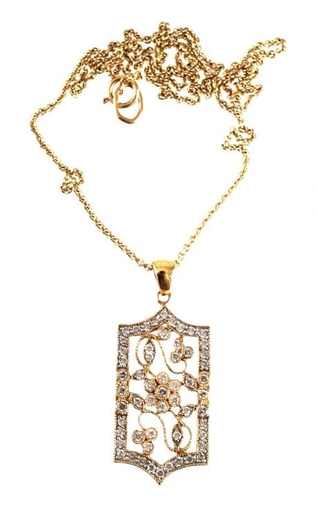 Appraisal: K YELLOW GOLD DIAMOND PENDANT K yellow gold pendant contains