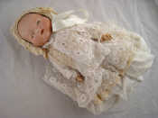 Appraisal: An Armand Marseille doll with closing eyes and lace bonnet