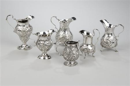 Appraisal: A collection of five Victorian silver cream jugs various makers