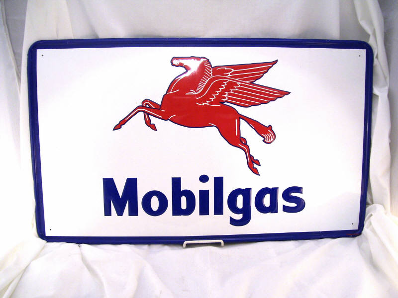 Appraisal: Mobilgas Tin Advertising Sign Soap Dispenser Includes Tin advertising sign