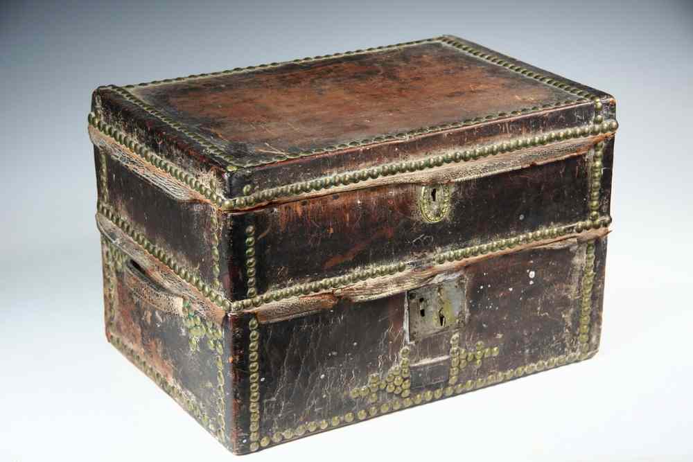 Appraisal: LEATHER COVERED TRUNK - Unique Early th c double-hinged three-part