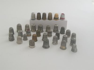 Appraisal: Nineteen various silver thimbles including two finger guards one with