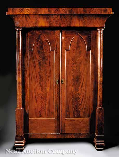 Appraisal: An American Late Classical Carved Mahogany Armoire in the Gothic