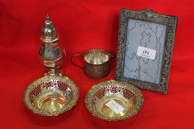 Appraisal: A SMALL COLLECTION OF SILVER WARES including a caster of