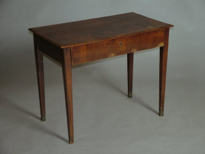 Appraisal: A Danish style mahogany single drawer side table th century