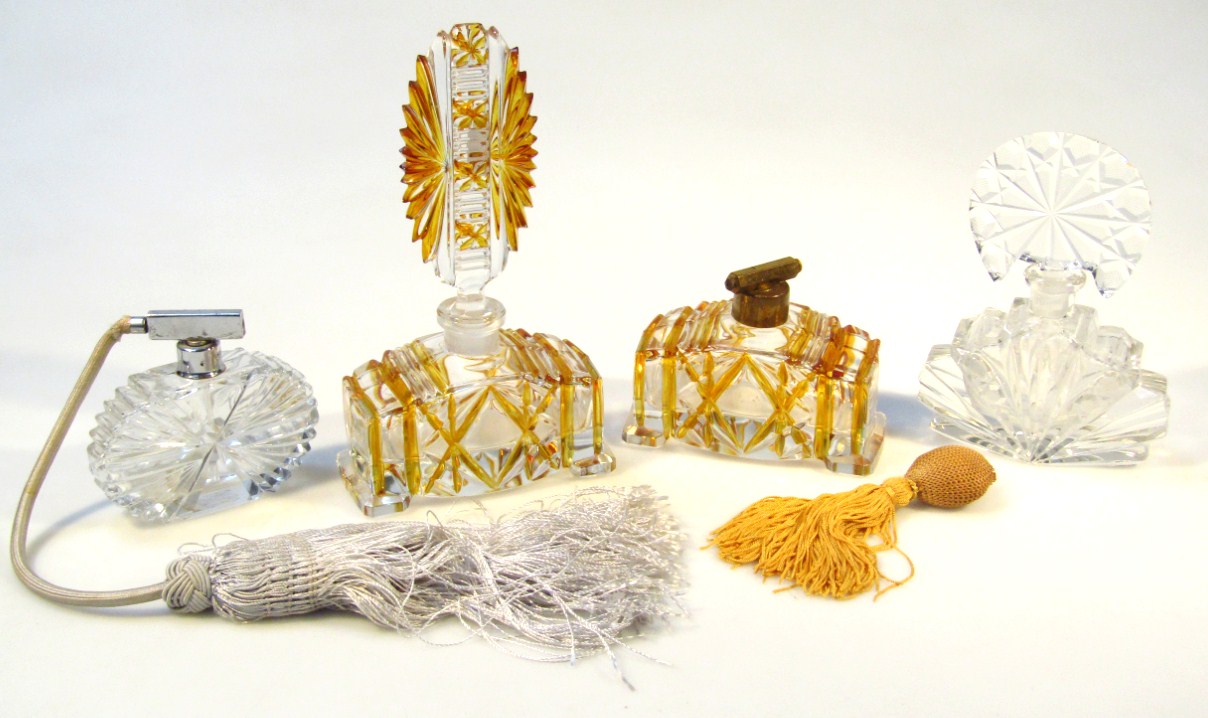 Appraisal: Various Art Deco design perfume bottles to include a pressed