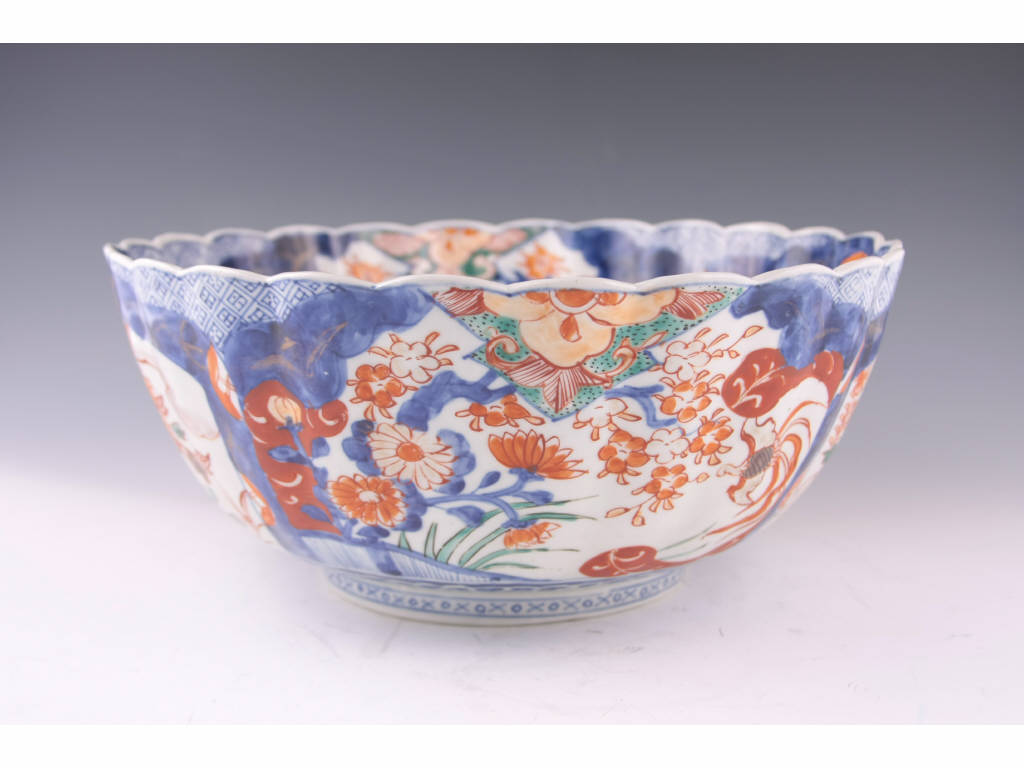 Appraisal: Imari Porcelain Punch Bowl Japan Late th c scalloped rim