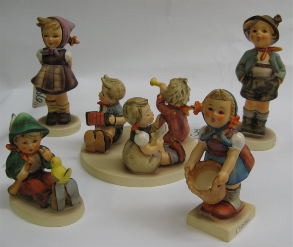 Appraisal: FOUR GERMAN HUMMEL FIGURES Little Band on base HUM -