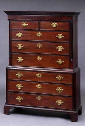 Appraisal: GEORGE III MAHOGANY CHEST ON CHEST The molded dentil cornice