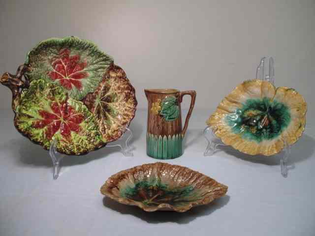 Appraisal: Four pieces of Majolica art pottery Includes a '' begonia