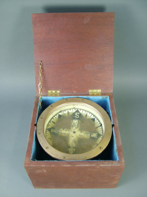 Appraisal: An Patent maritime liquid filled bronze mounted compass by E