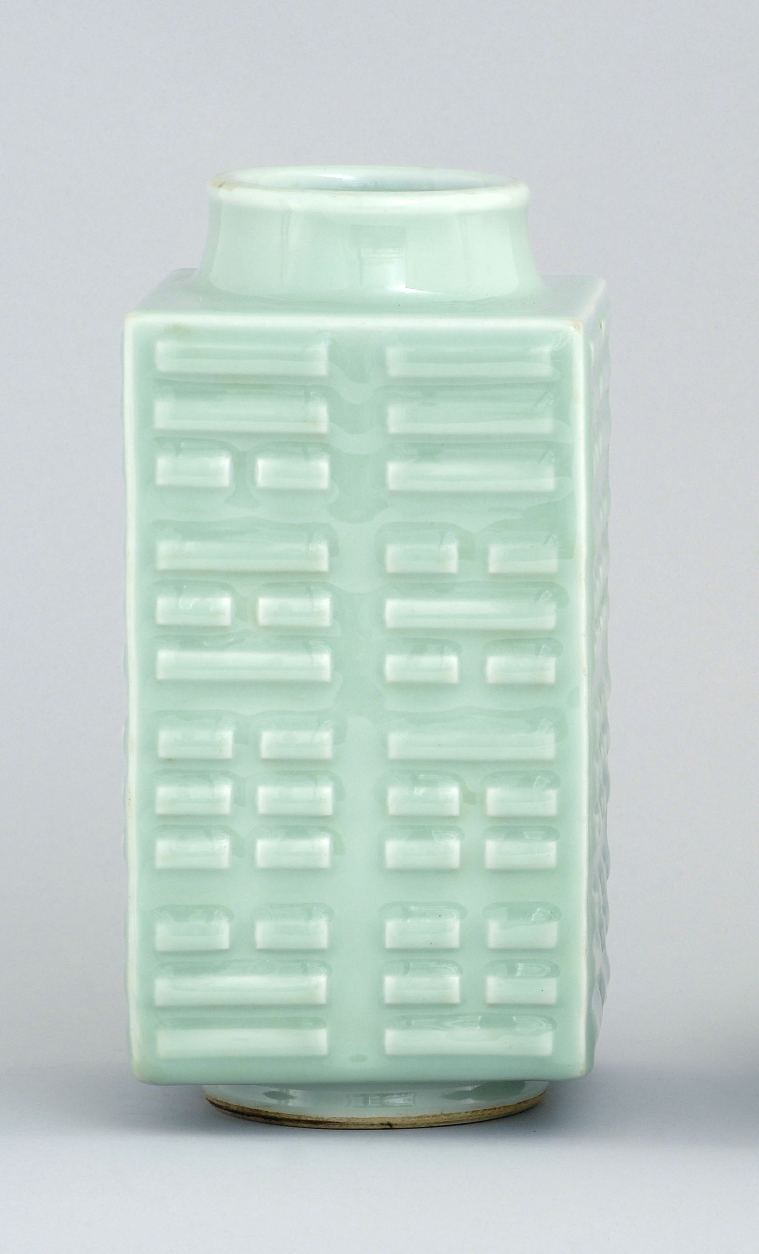 Appraisal: CELADON PORCELAIN VASE In rectangular form with trigrams design Six-character