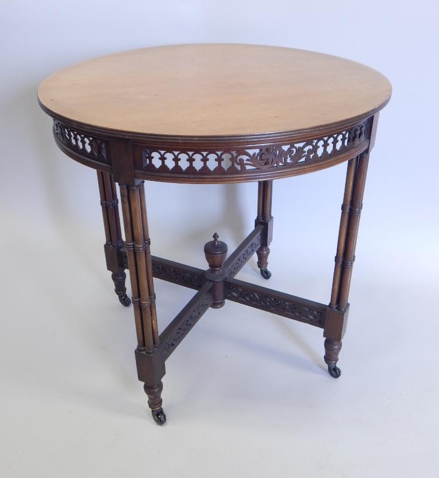 Appraisal: An Edwardian mahogany occasional table the circular top with a