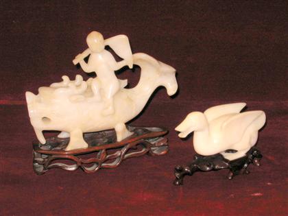 Appraisal: Two white jade figures chinese th c A dragon carp