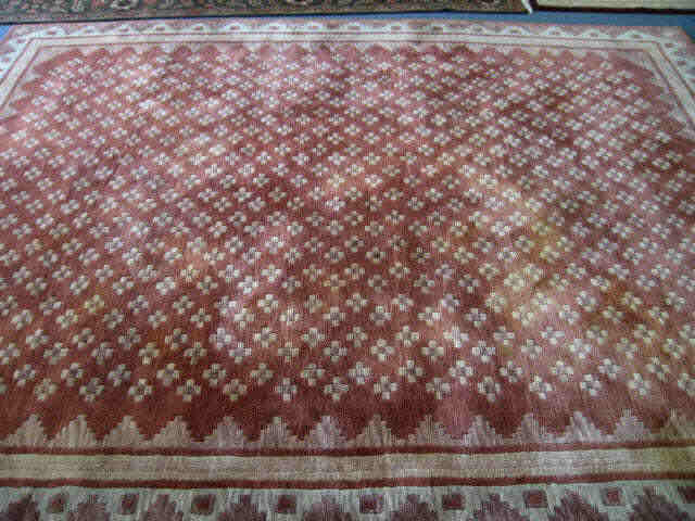 Appraisal: Chinese Handmade Rug geometric floral earthtones ' x '