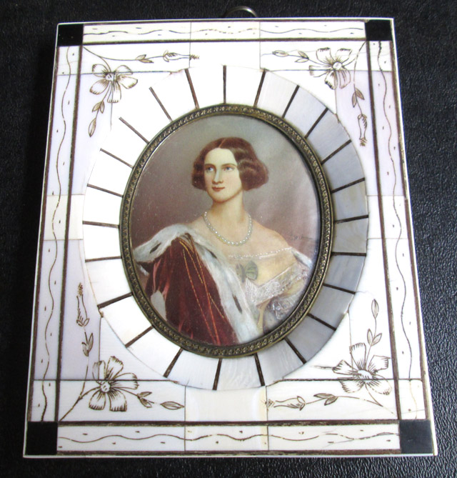 Appraisal: HAND PAINTED MINIATURE ON IVORY of a young woman of