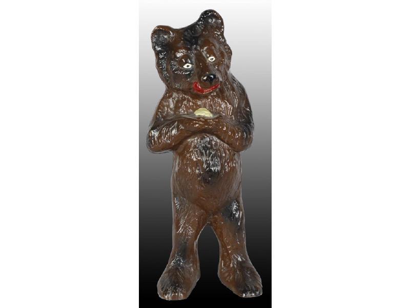 Appraisal: Honey Bear Cast Iron Doorstop Description Full-figure Depicts bear holding