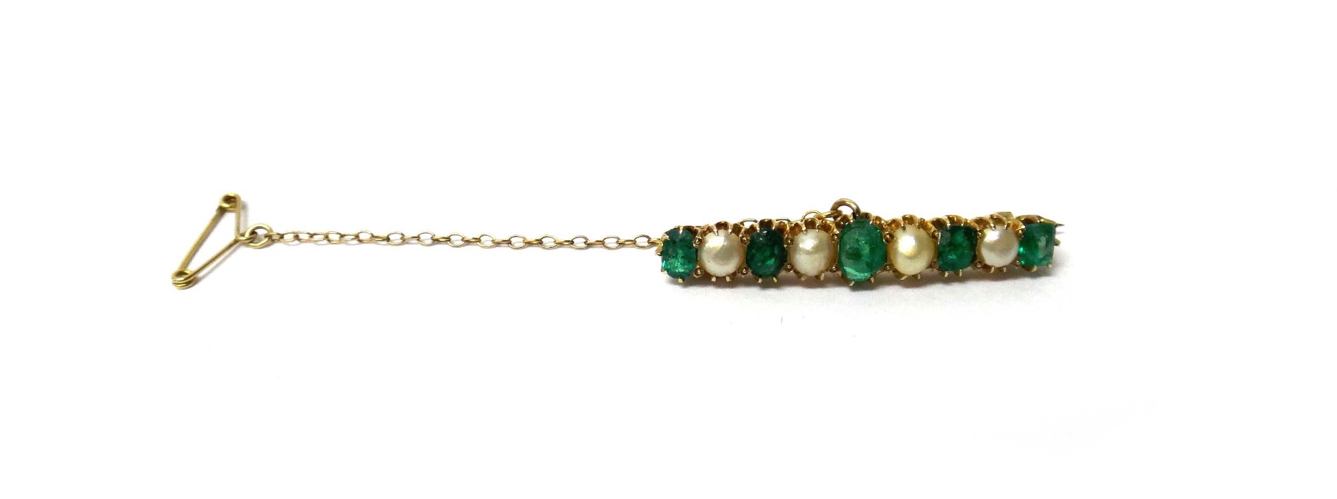 Appraisal: A gold emerald and cultured pearl brooch mounted with a