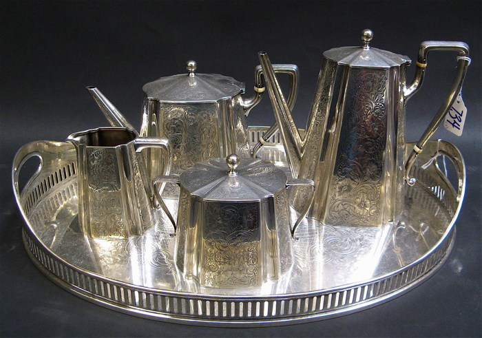 Appraisal: STERLING SILVER TEA AND COFFEE SET displayed on a Victorian