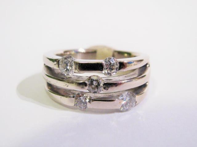 Appraisal: A K white gold three row ring with five graduated