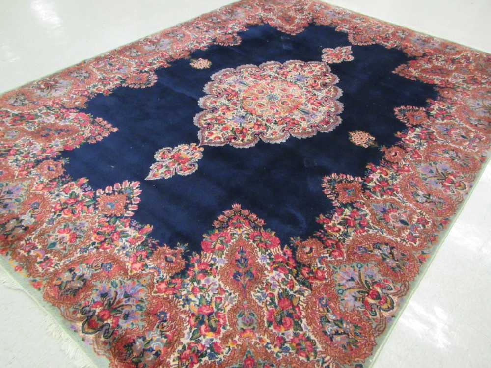 Appraisal: A KARASTAN AMERICAN ORIENTAL CARPET Kerman pattern central medallion on